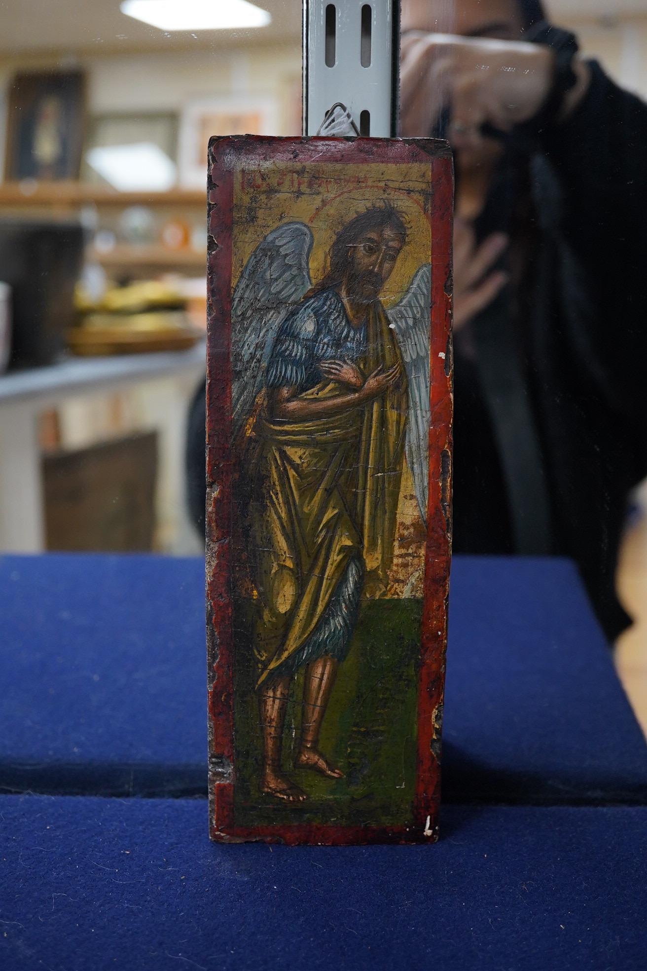 A Cretan Icon, 17th Century, 23cm x 7.5 cm. Condition - minor chips to front